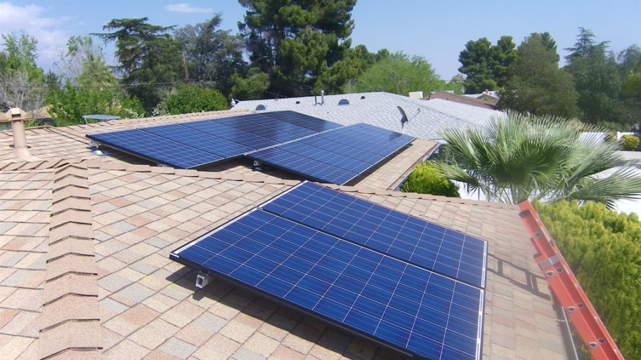 Solar panels on the shingled roof of a home in Southern California.