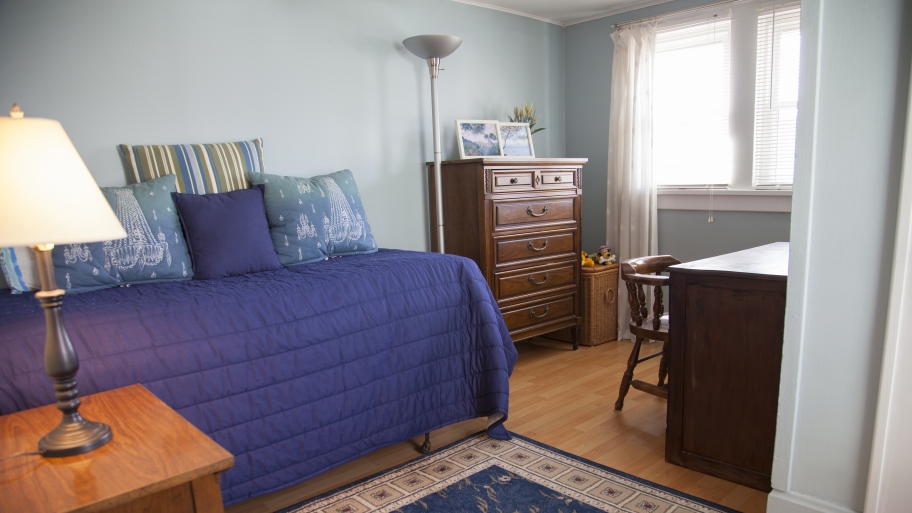 a newly painted bedrom with blue walls