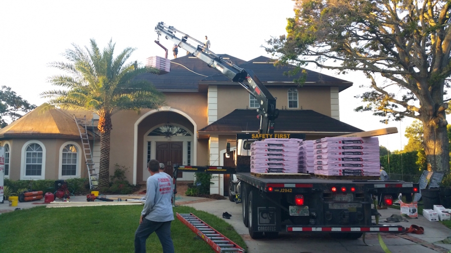 roofing contractors working on home