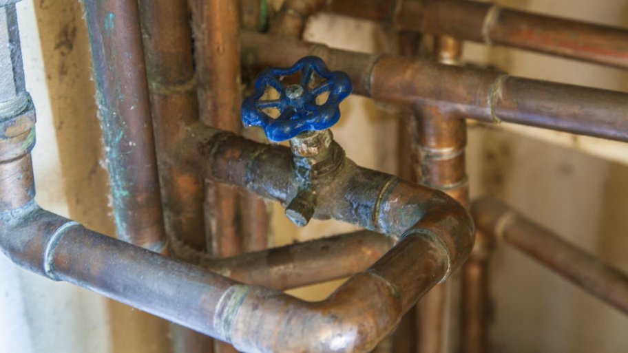 Copper pipes and a valve knob