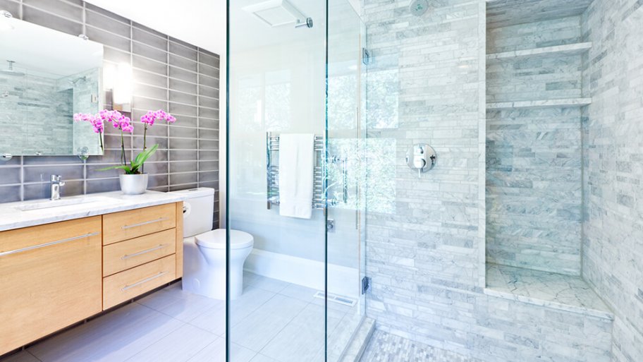 Bright contemporary bathroom with marble tiles Bright contemporary bathroom with marble tiles