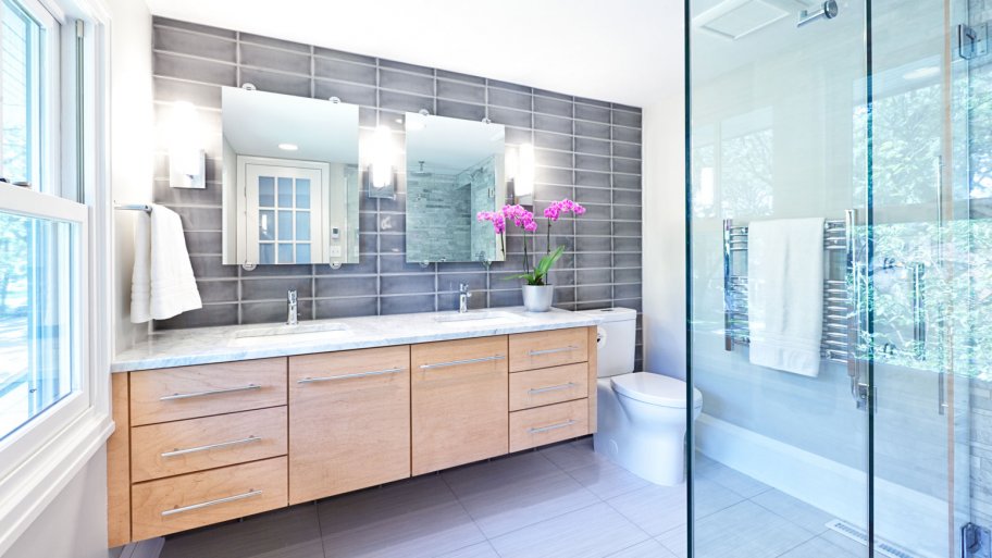 bathroom remodel two sinks and shower (Photo by YinYang/iStock/Getty Images Plus via Getty Images)