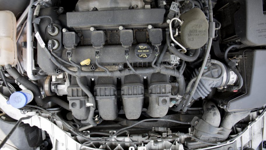 a car with the hood up exposing the engine
