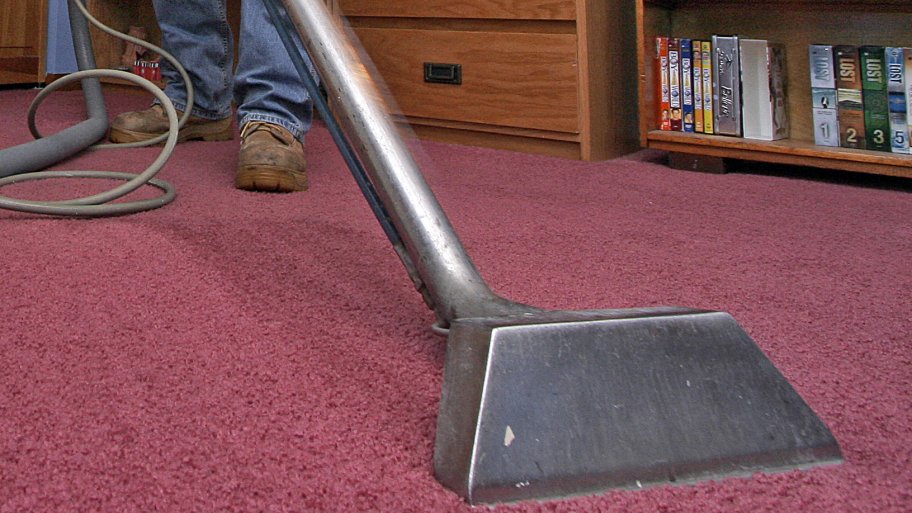 Machine cleaning carpet.