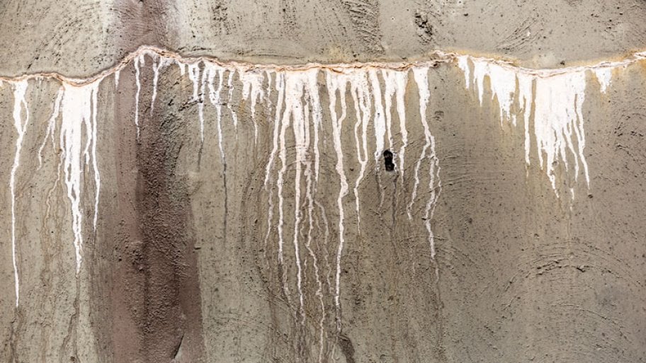 Concrete slab foundation leak and water damage
