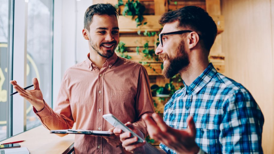 Contractor and client discussing a project