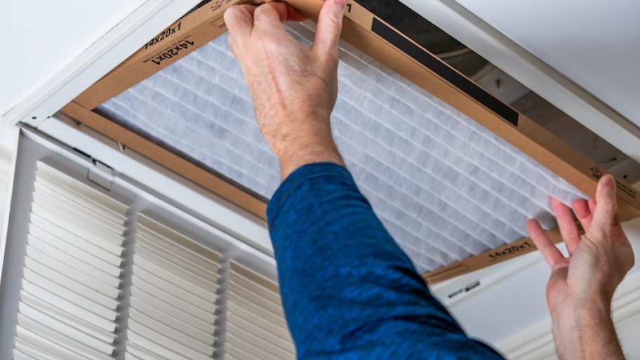 arms reach up to duct vent to replace filter