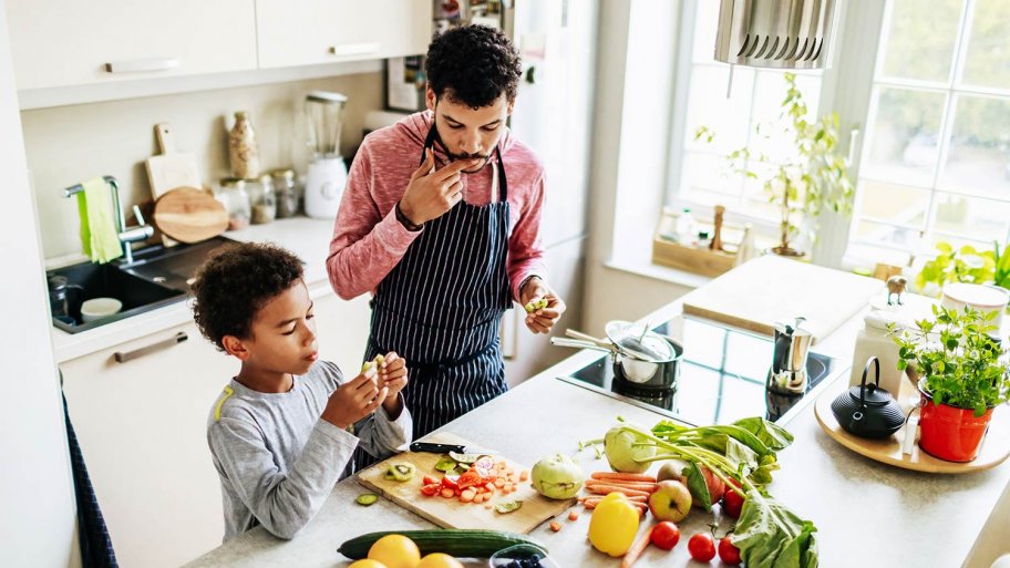 Father and sun fix a meal