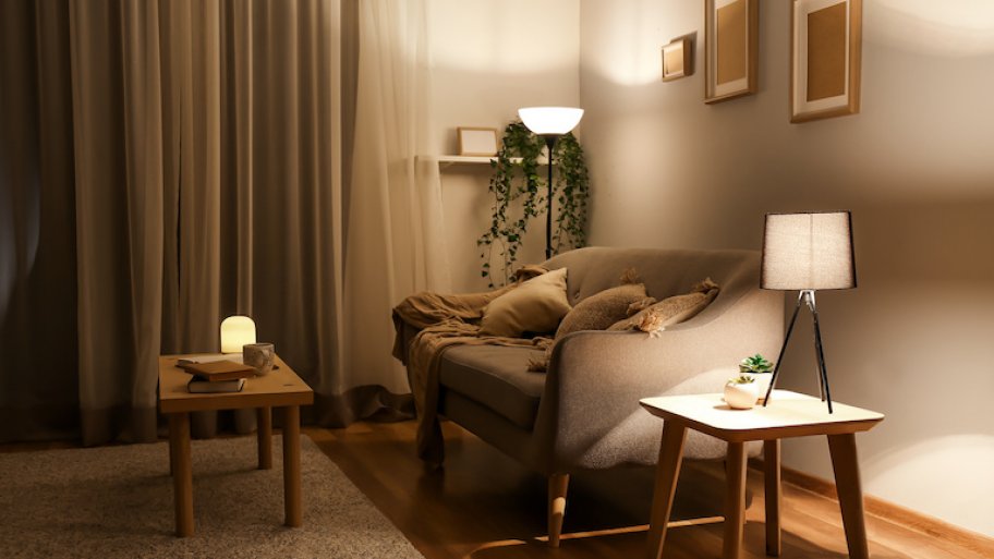 interior living room with two lamps and cozy candle light