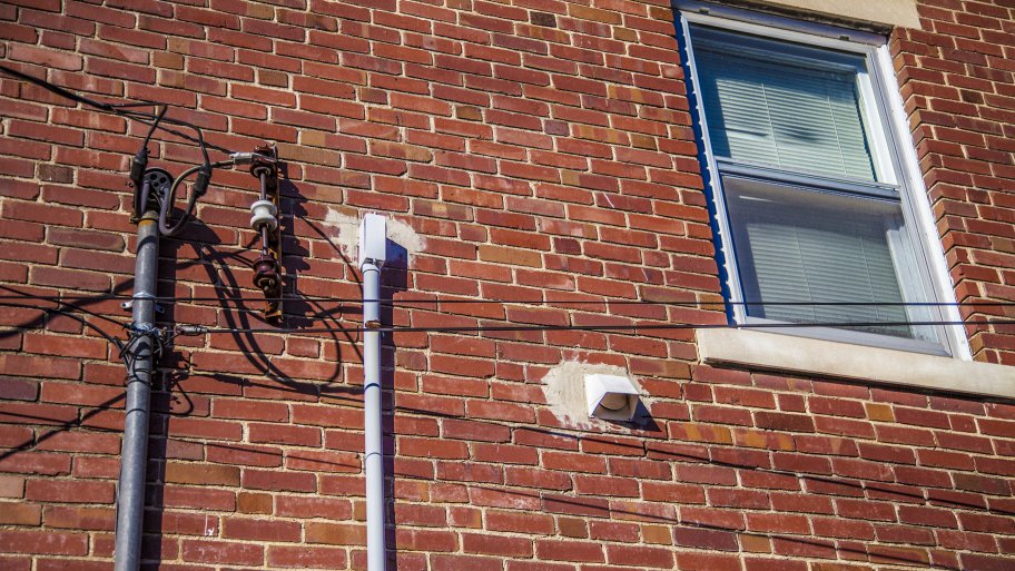 Electricity supply termination at the side of a building