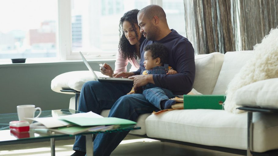 Family searching for homes online (Photo by LWA / Stone via Getty Images)