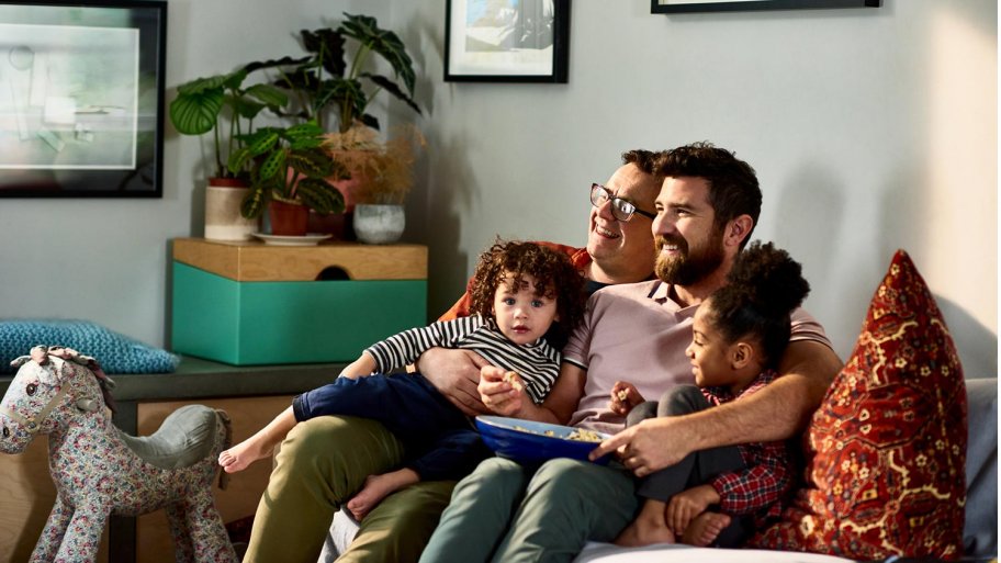 Fathers and children watch TV (Photo by 10'000 Hours/DigitalVision via Getty Images)