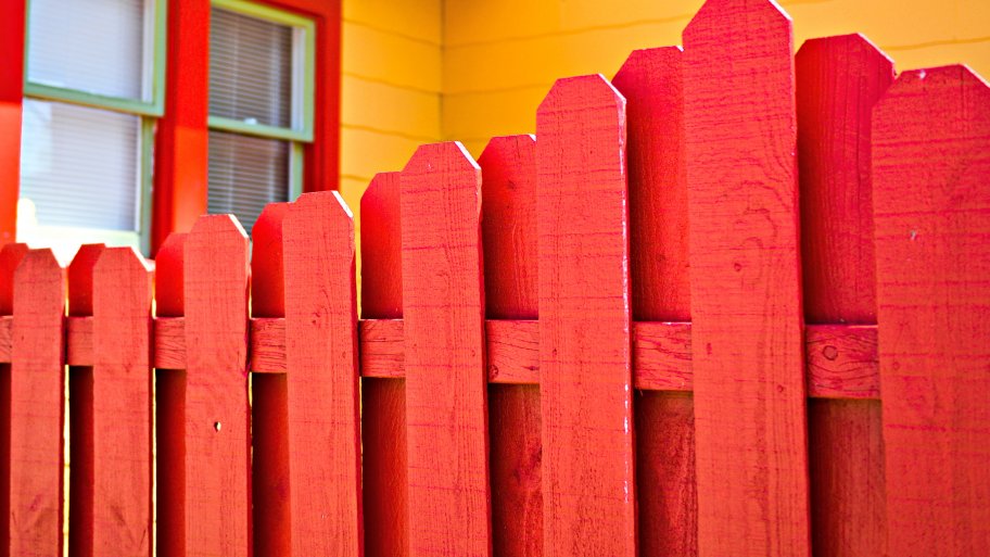 wood fence painted red