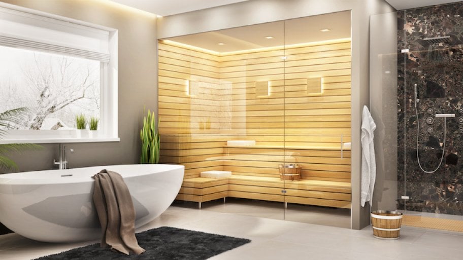 a wood sauna in a home bathroom