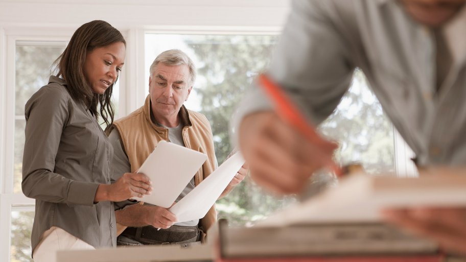 Homeowner talks to contractor