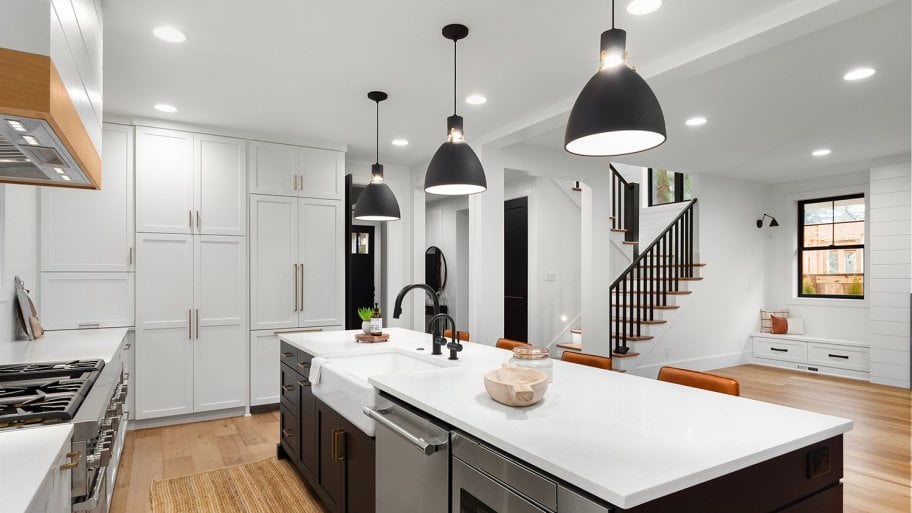 Interior of a modern kitchen with pendant lights