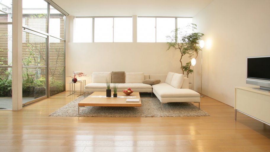 An interior of a living room with laminate flooring
