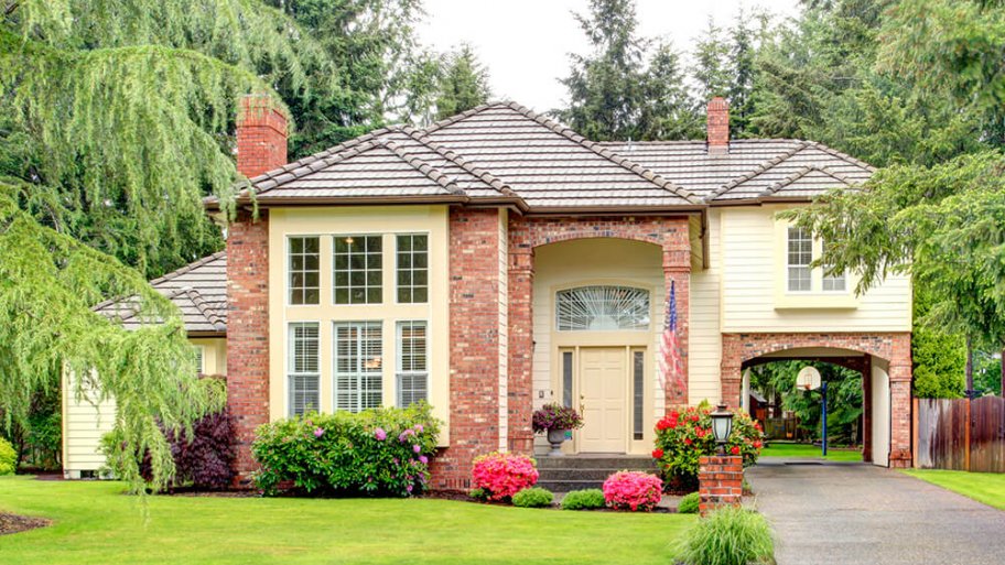 Large suburban home with brick siding Large suburban home with brick siding