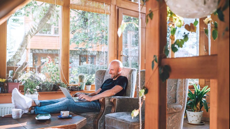 Man sits in sunroom