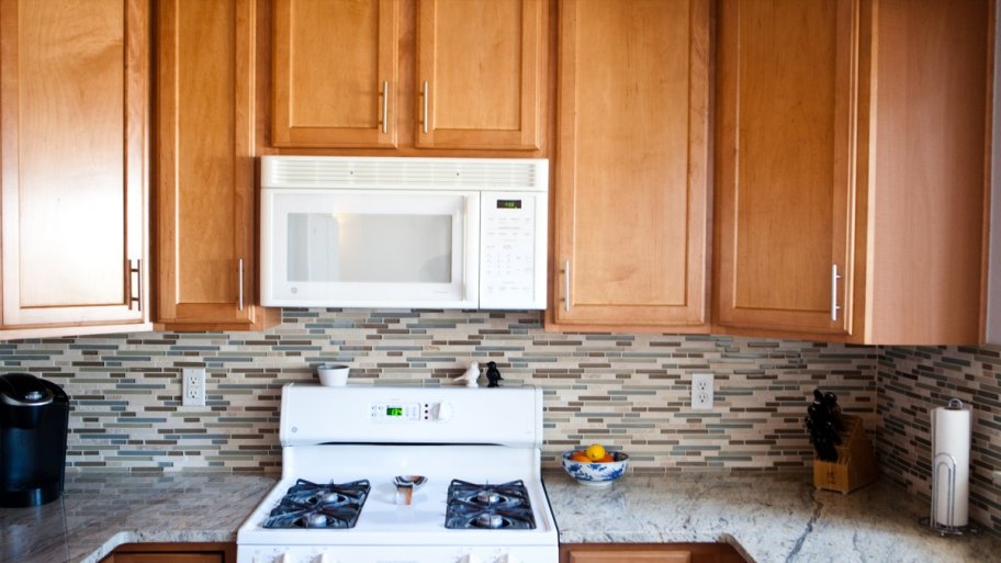 kitchen with microwave above oven