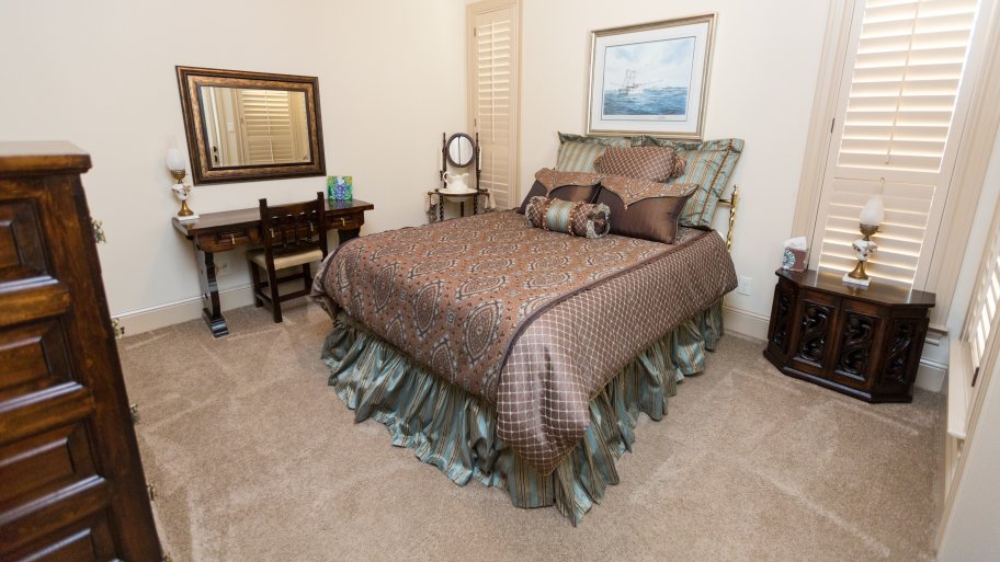 bedroom with hurricane shutters