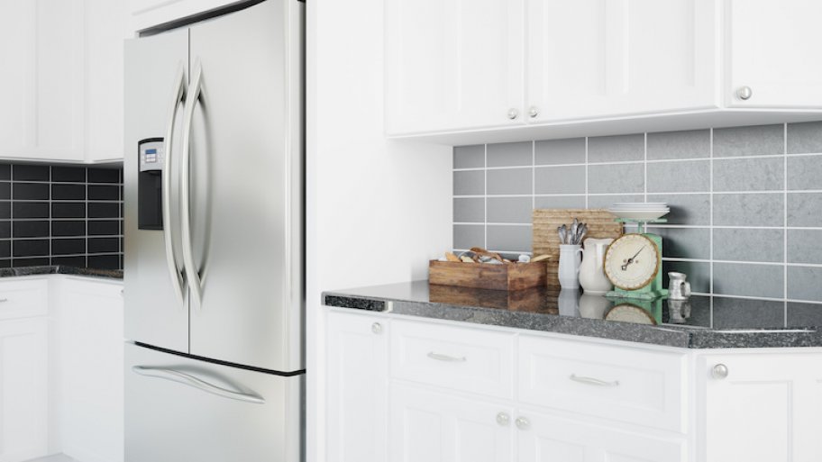 a silver refrigerator in a modern kitchen