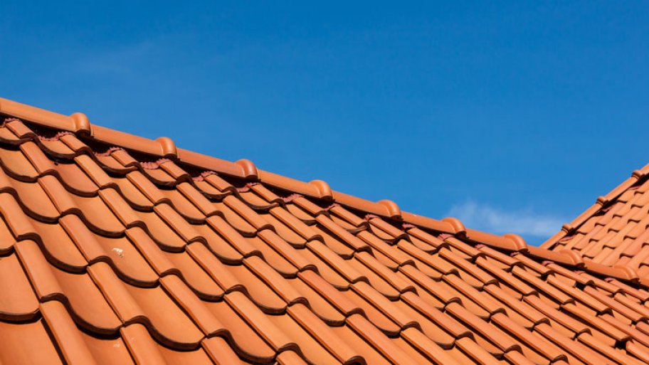 roof tile pattern, close up, over blue sky
