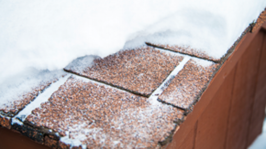 snow melting on a roof