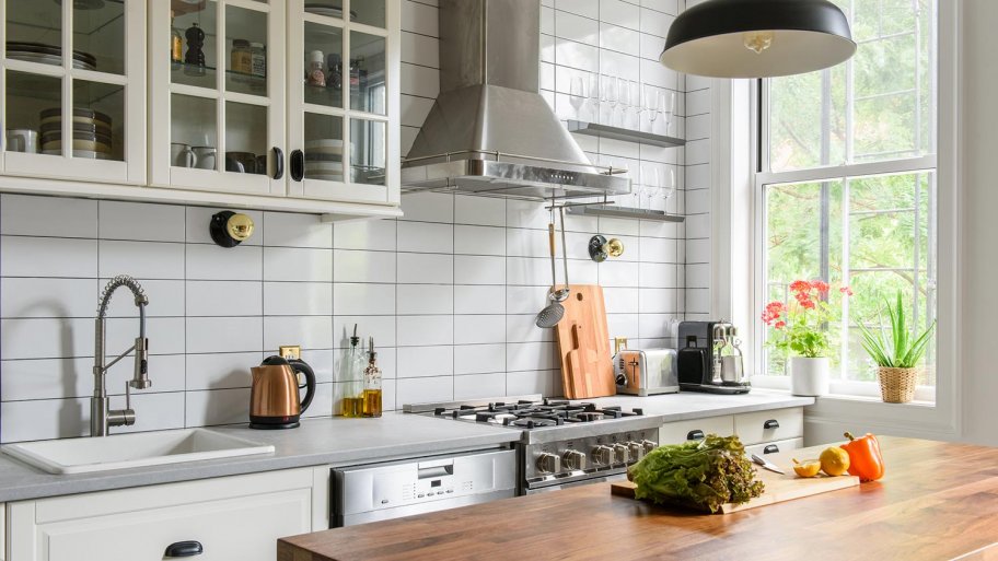 Solid surface counters with butcher block island