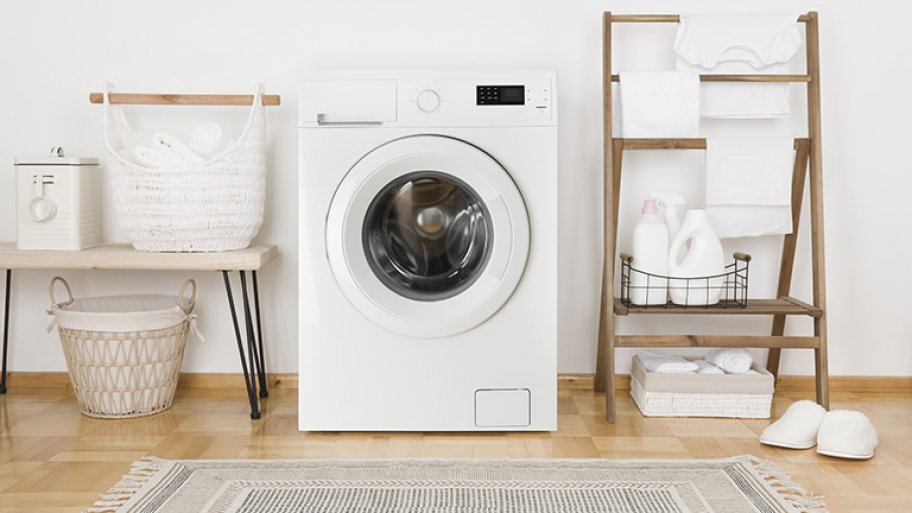 A washing machine in a laundry room