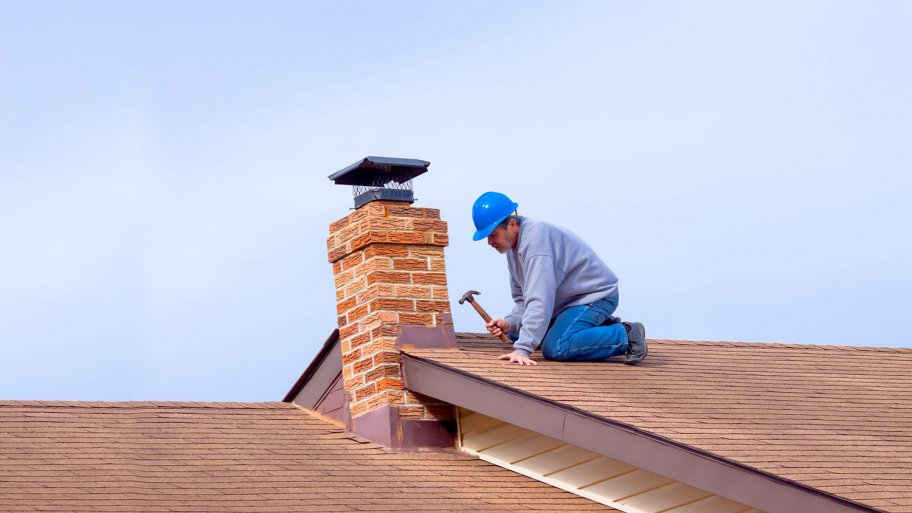 A worker installing new roof