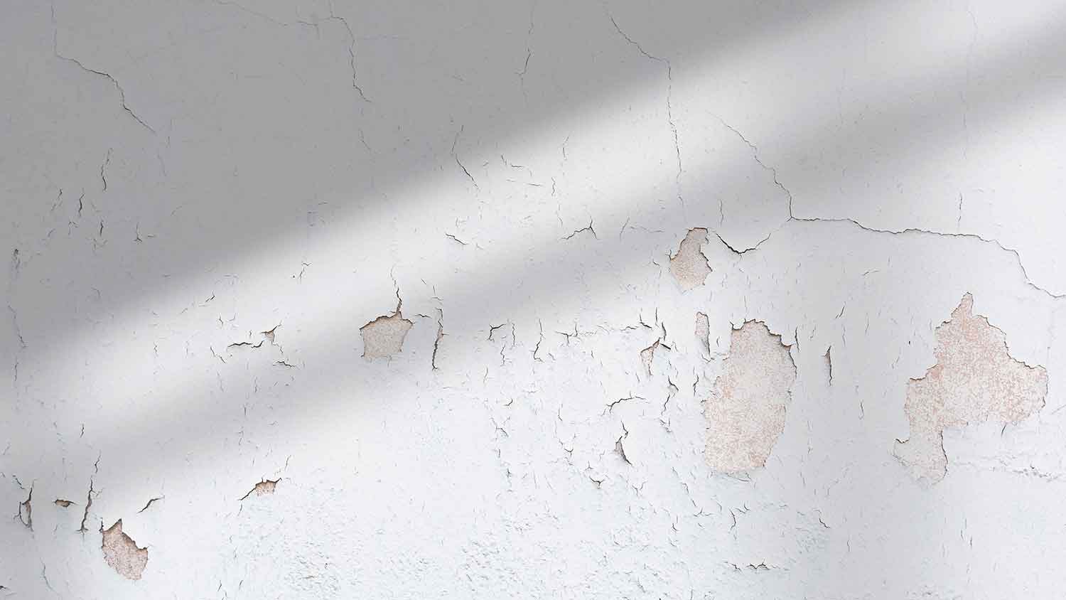 Old paint peeling off a wall