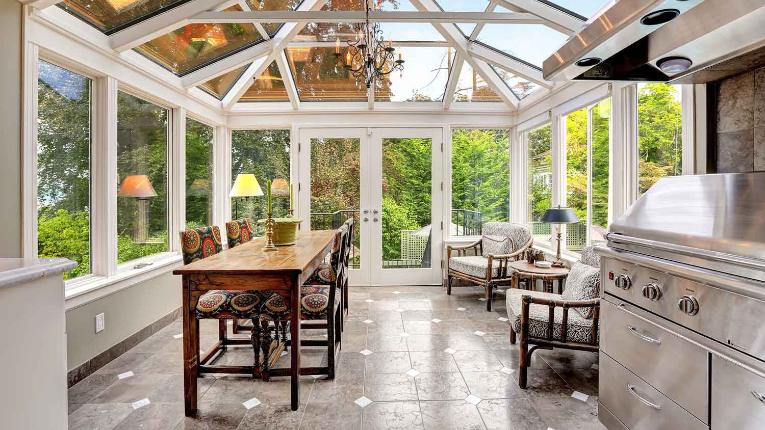 Sunroom with grill and dining table