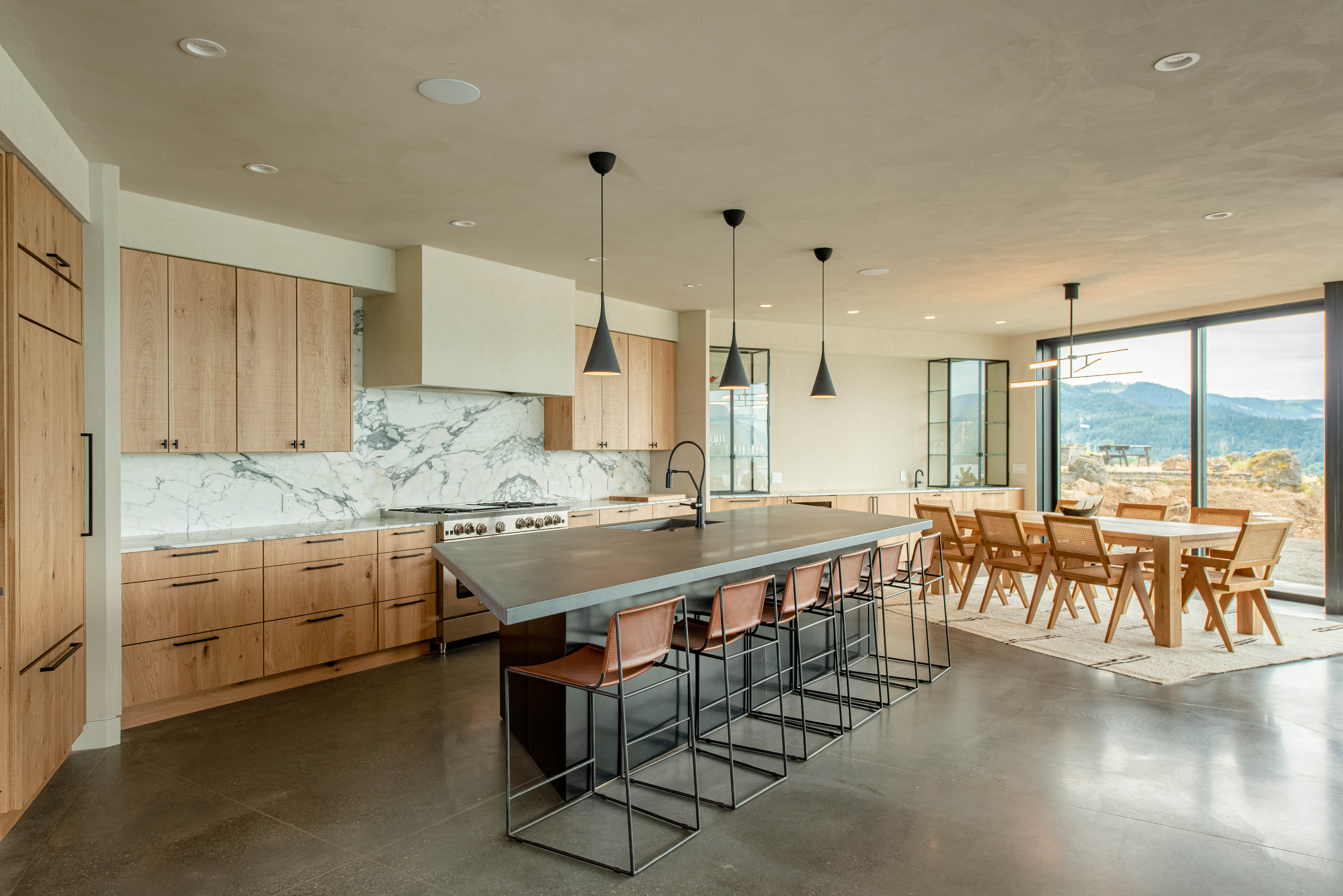 Wood kitchen cabinets and granite island 