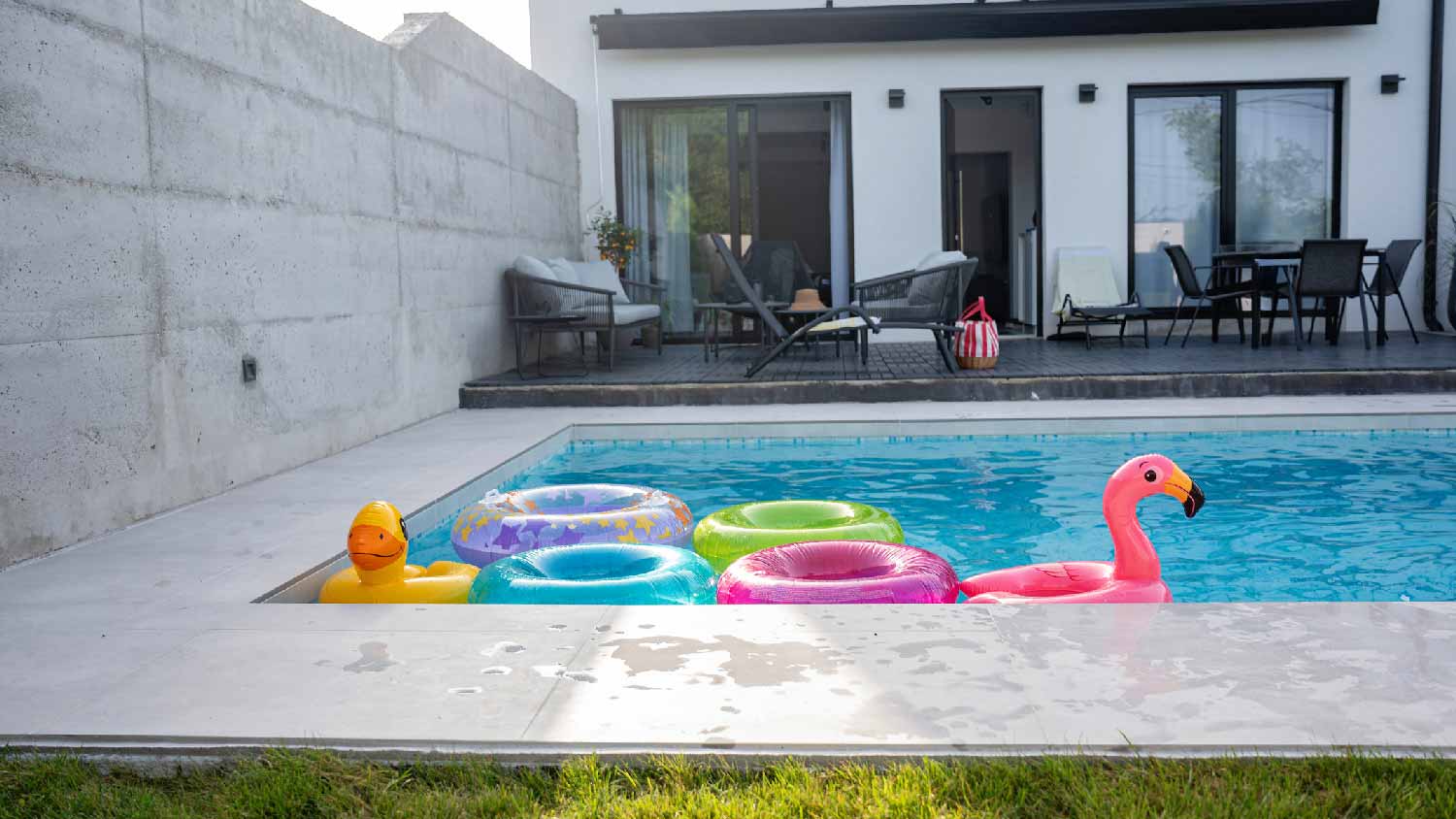 A swimming pool with inflatable toys