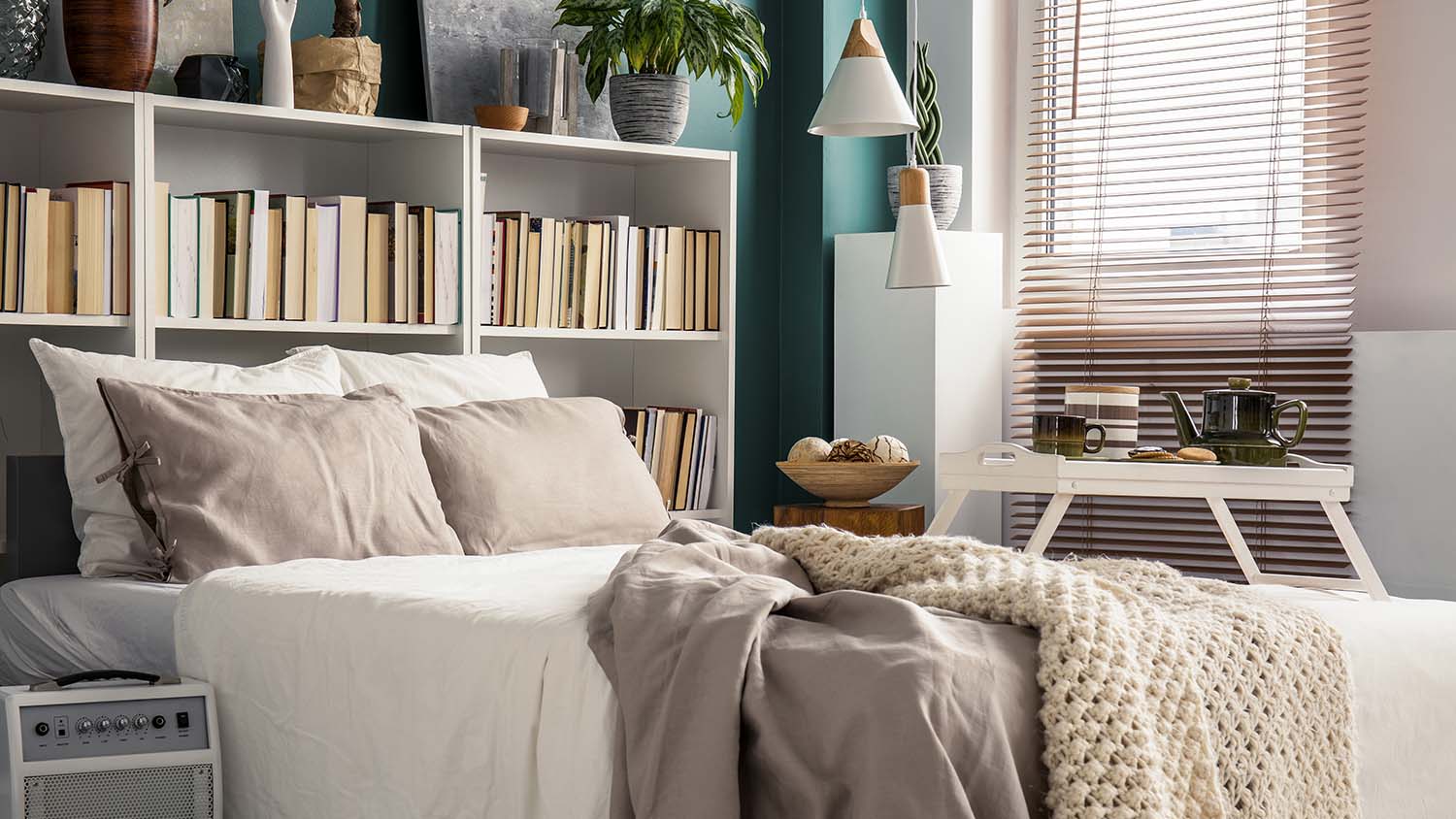 bed with bookshelf as headboard