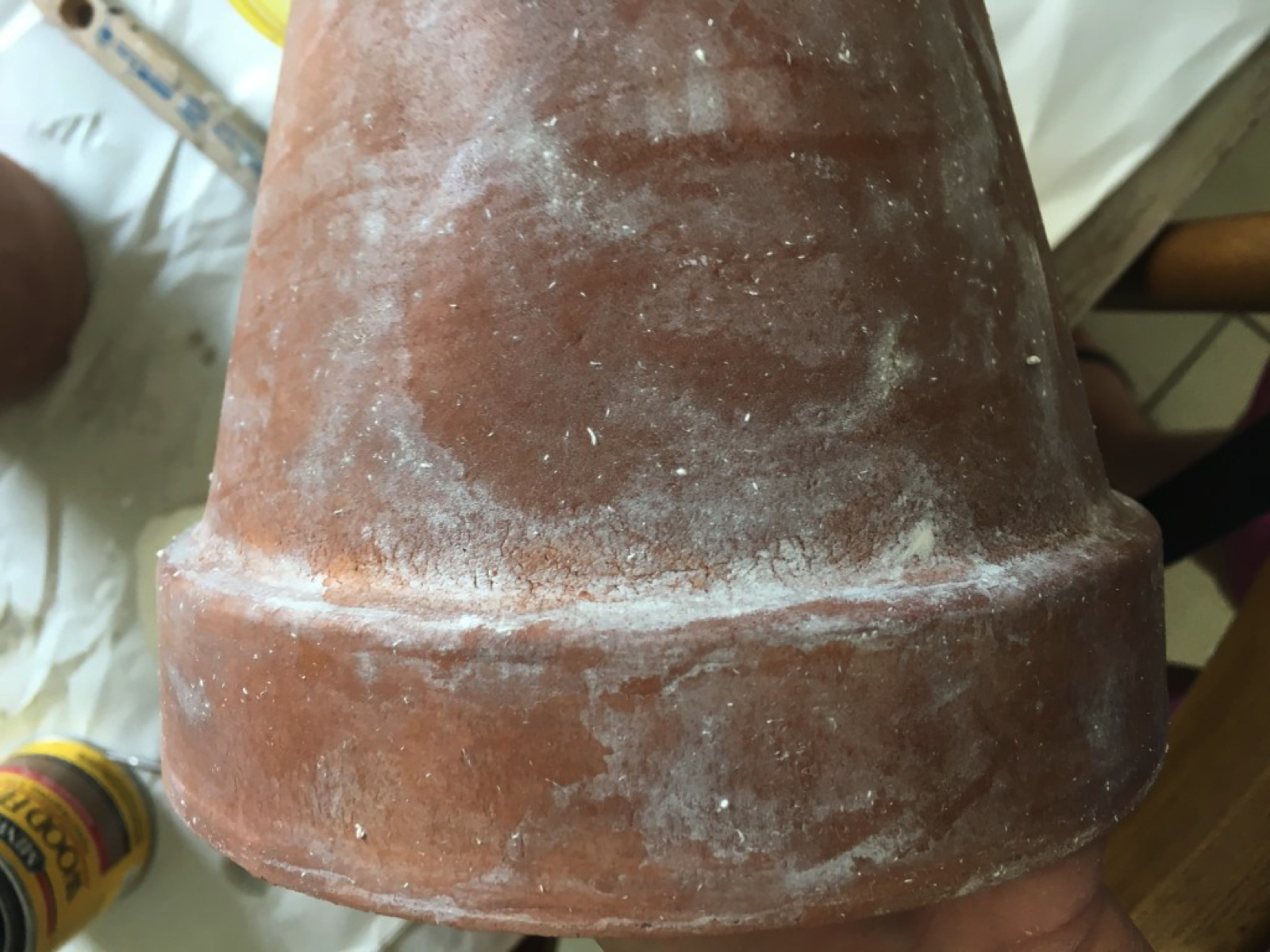Terracotta pot with whitewash.