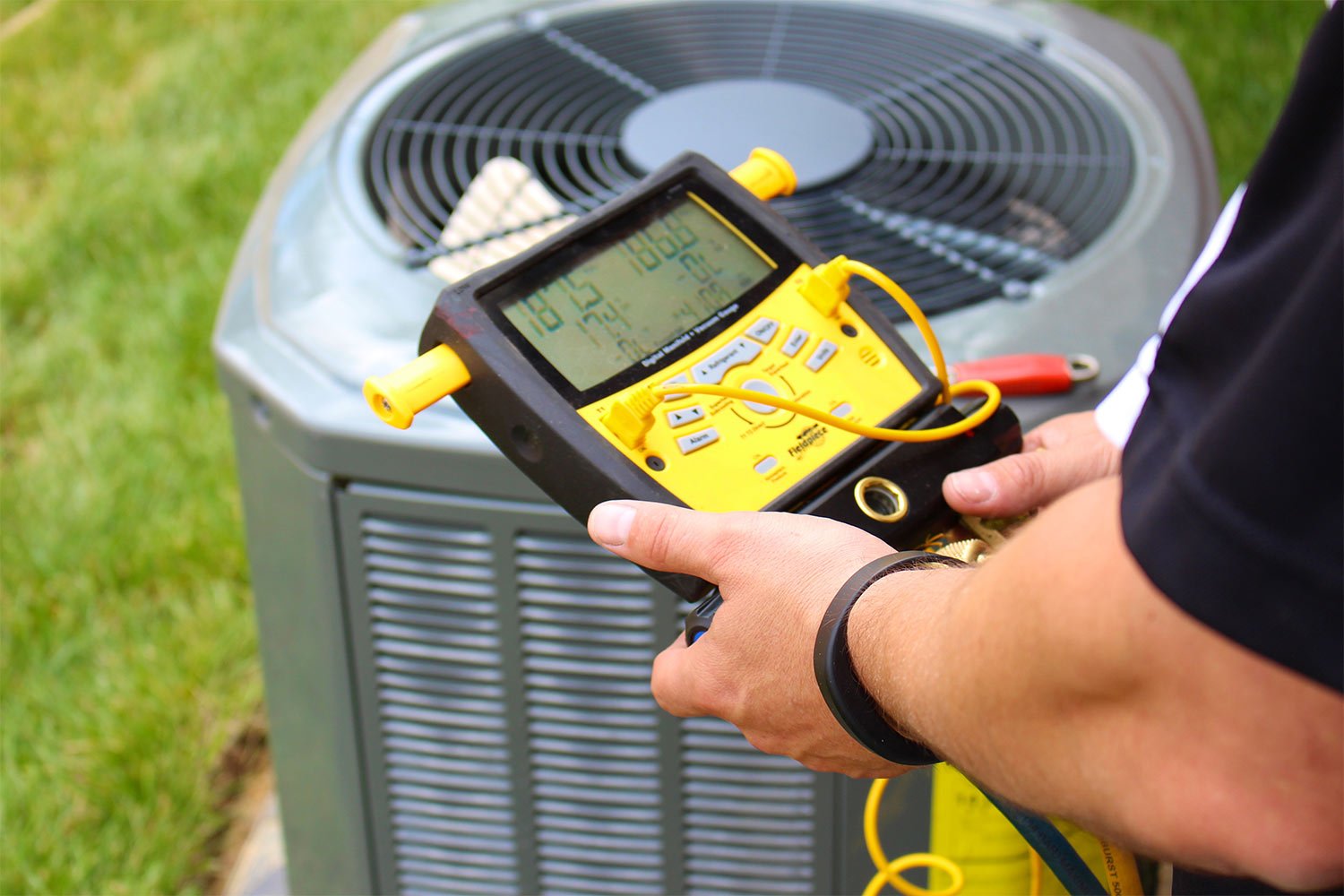 HVAC repairman running tests