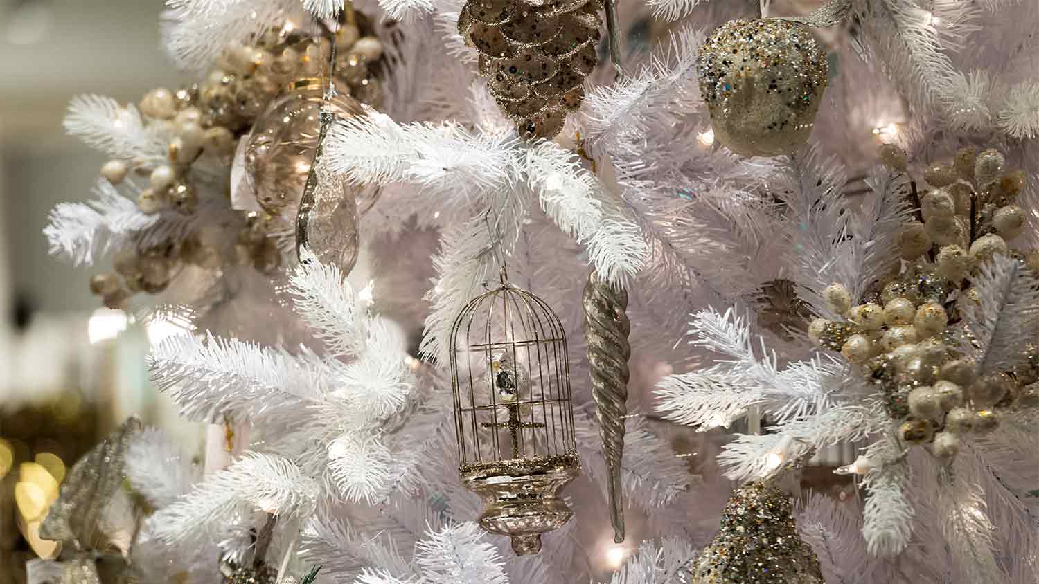 textured ornaments on white christmas tree