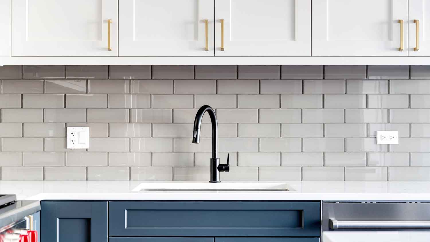 Kitchen with tile backsplash and shaker cabinets