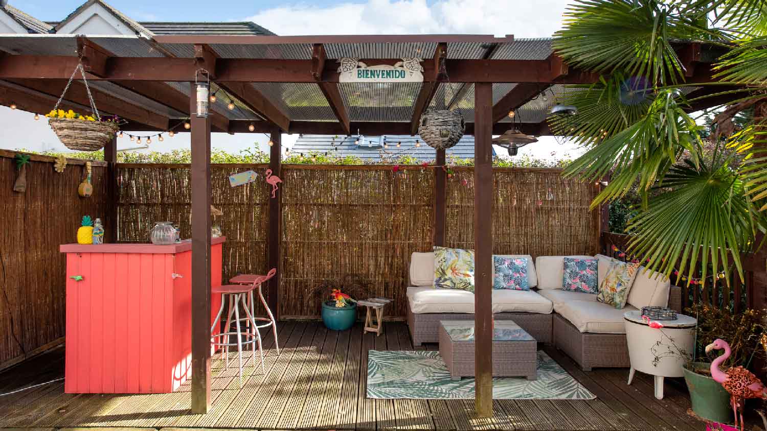 A timber pergola with an outdoor bar