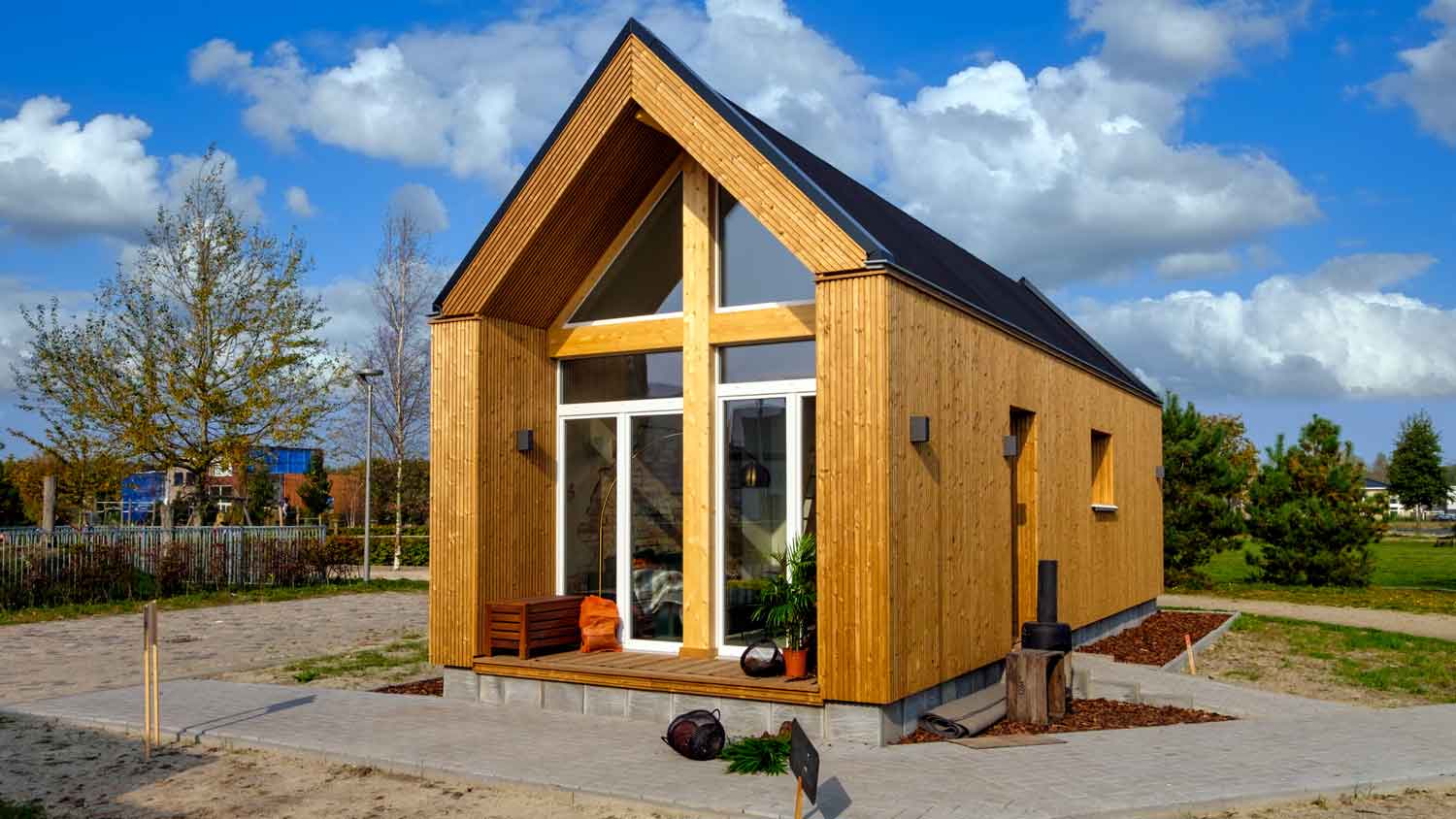 wood tiny house with exposed foundation