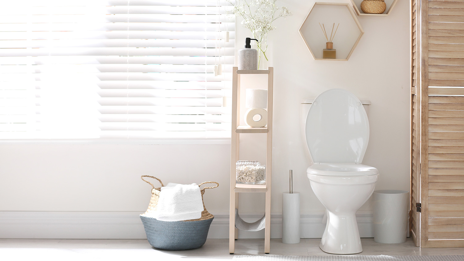 Modern toilet bowl in stylish bathroom interior