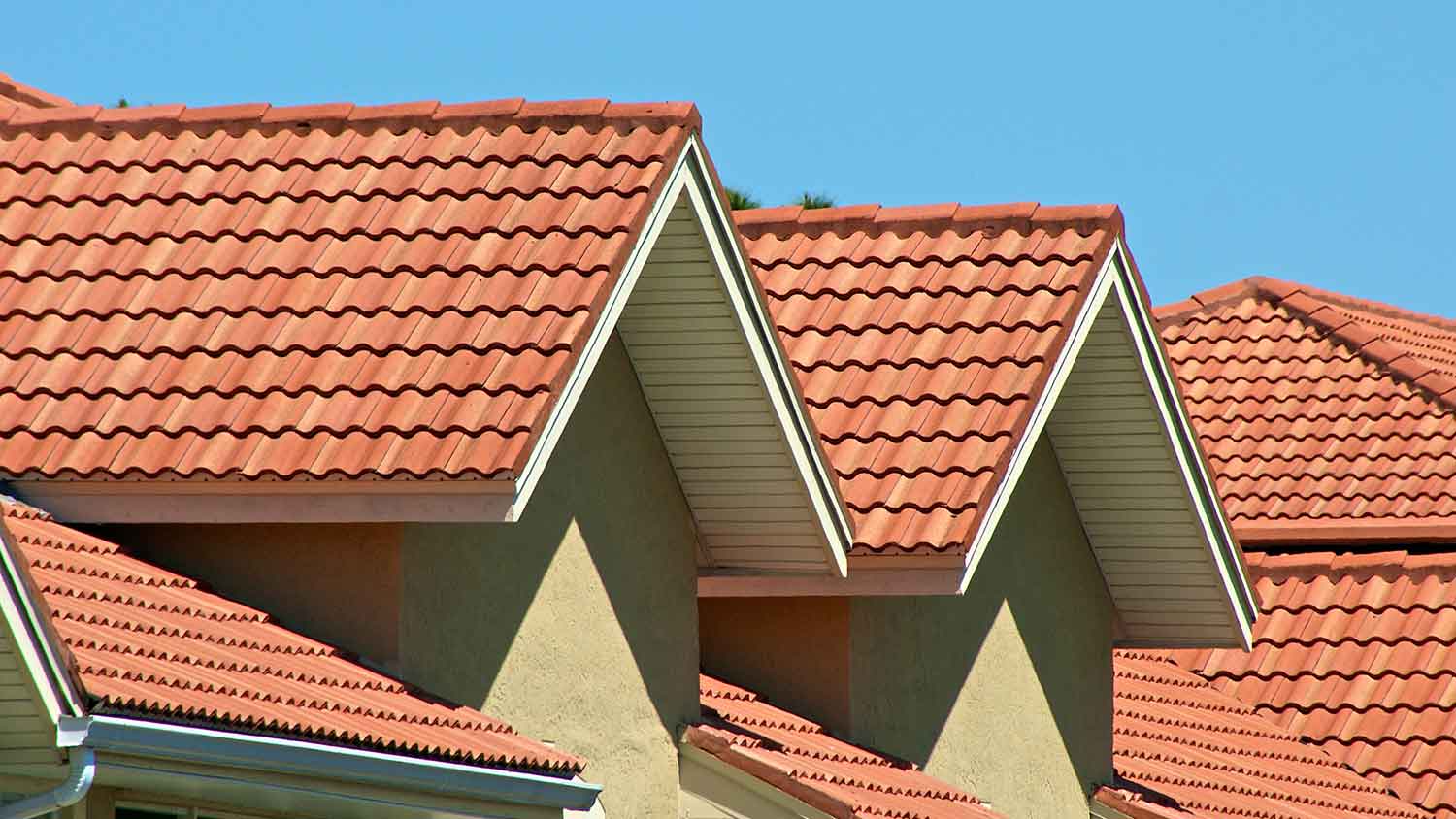 Tile shingles installed on the roof of the houses