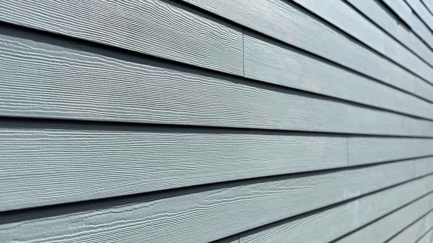 Detail of traditional vinyl siding installed on a house