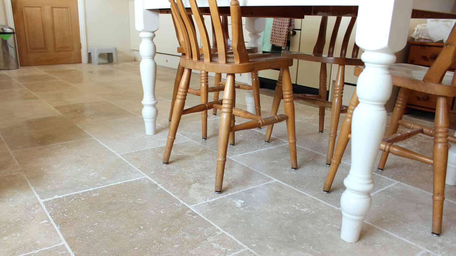 Travertine tiles used for flooring in a kitchen