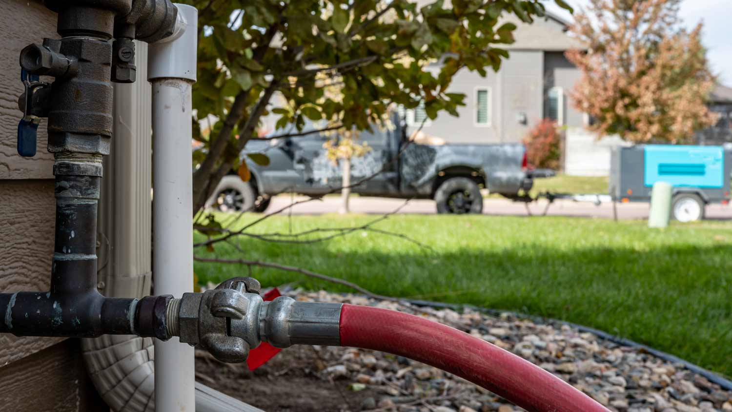 professionally turning on sprinkler water system