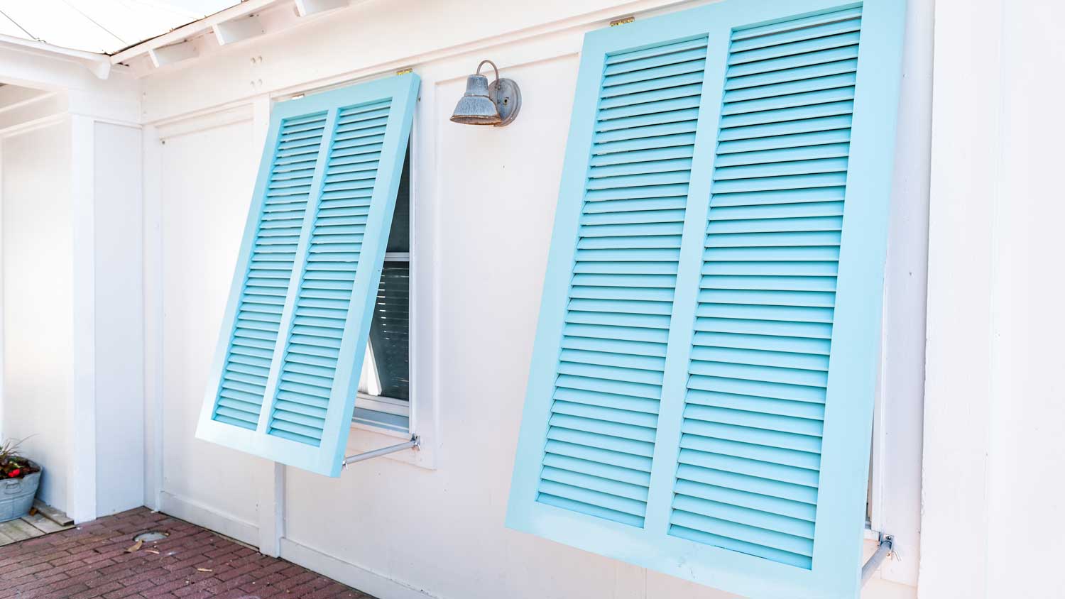 Turquoise hurricane shutters