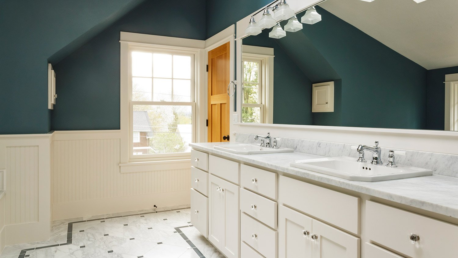 Green updated bathroom in an old historic home