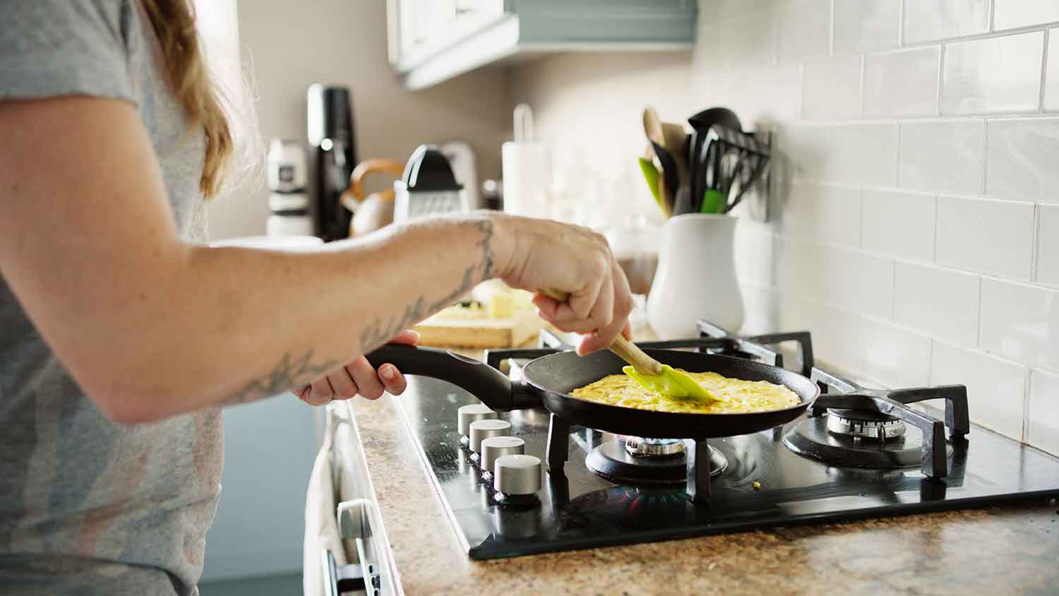 Cooking breakfast on a gas stove top